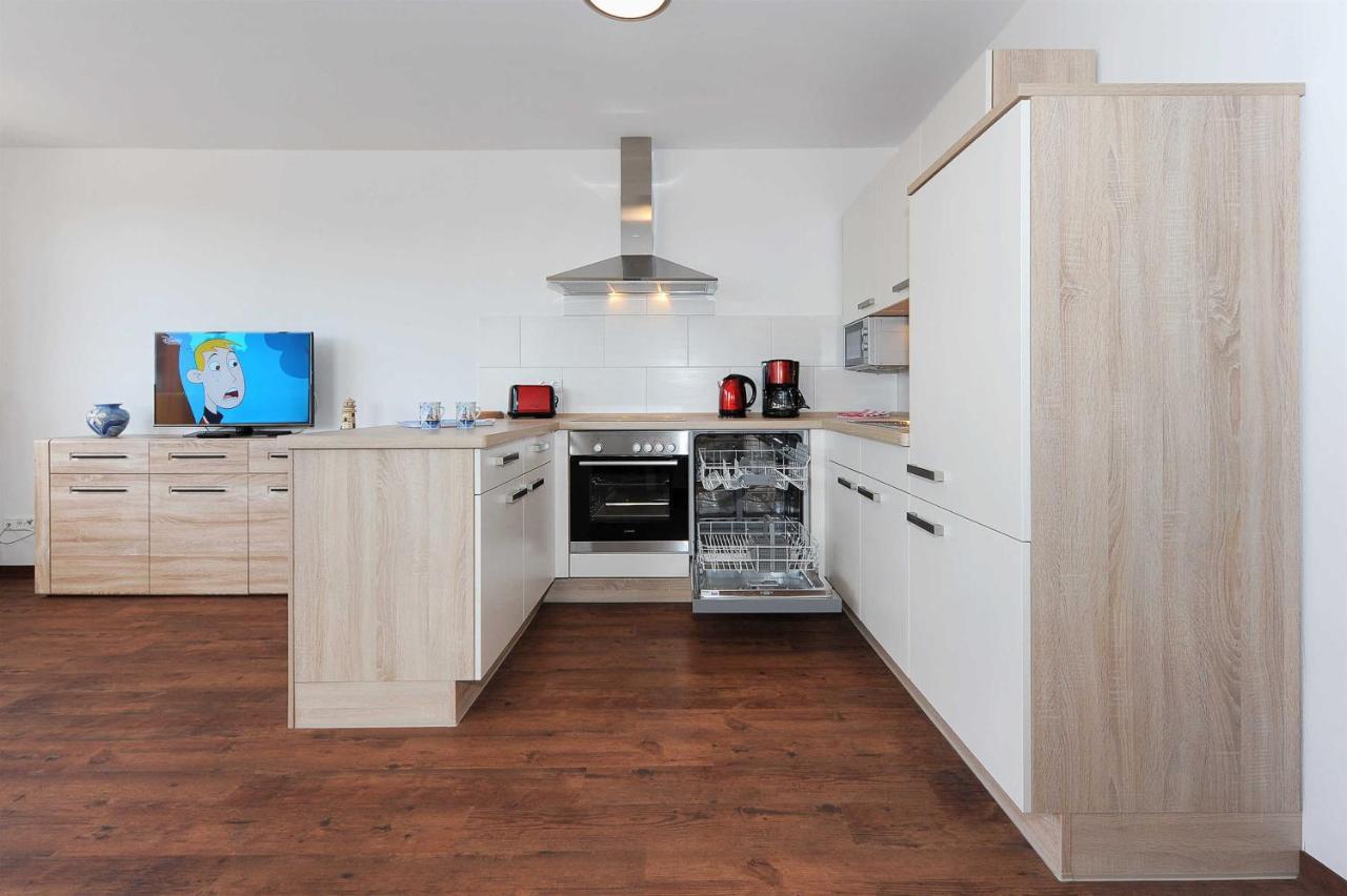 Haus Leuchtturm Appartement Bensersiel Buitenkant foto